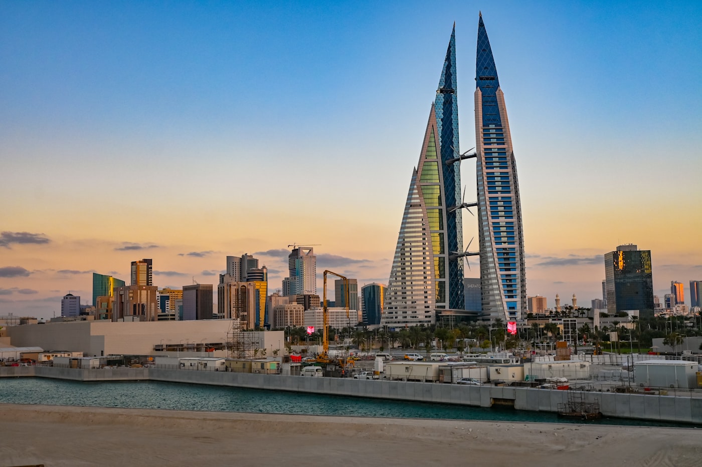 The twin sails of the Bahrain World Trade Center at sunrise