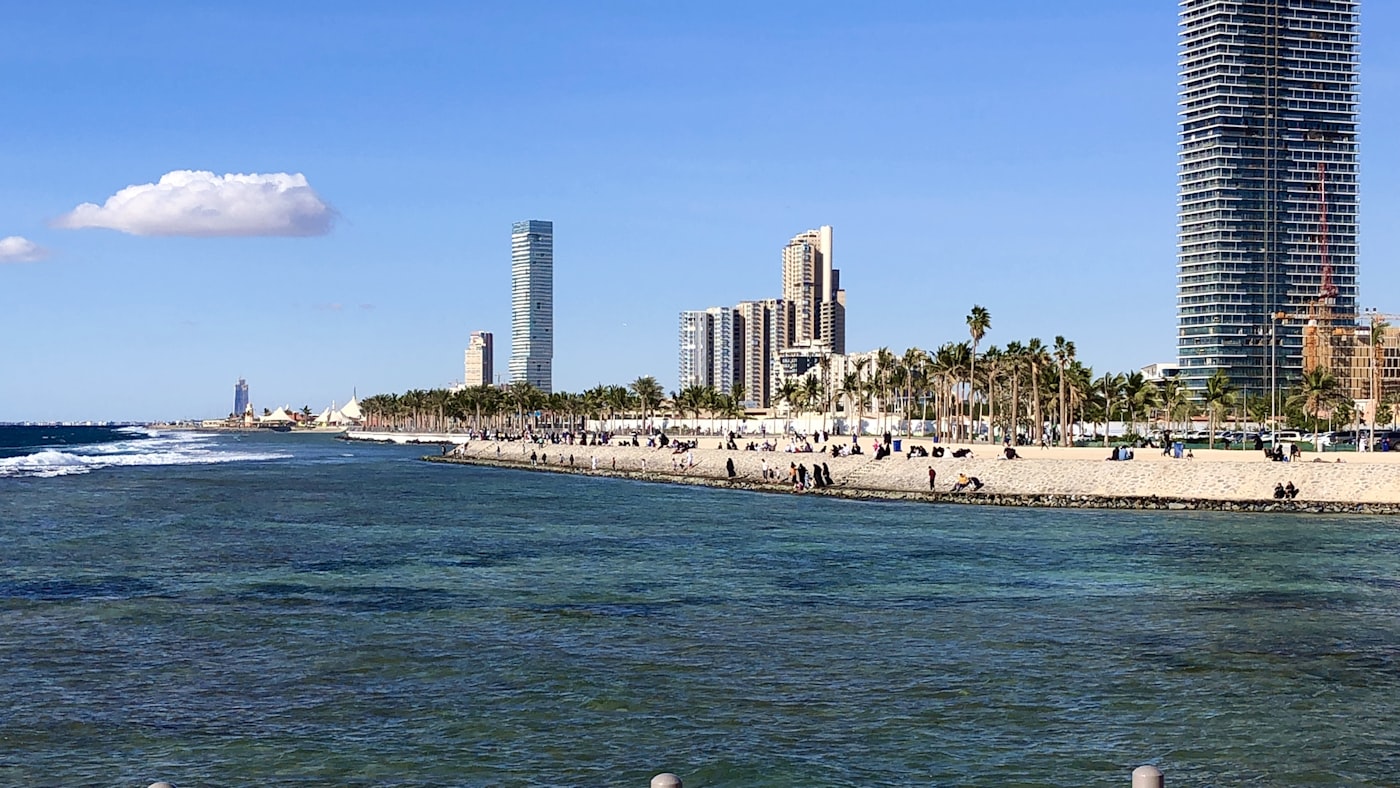 Palm-lined waterfront and towers along the Red Sea coast at Jeddah
